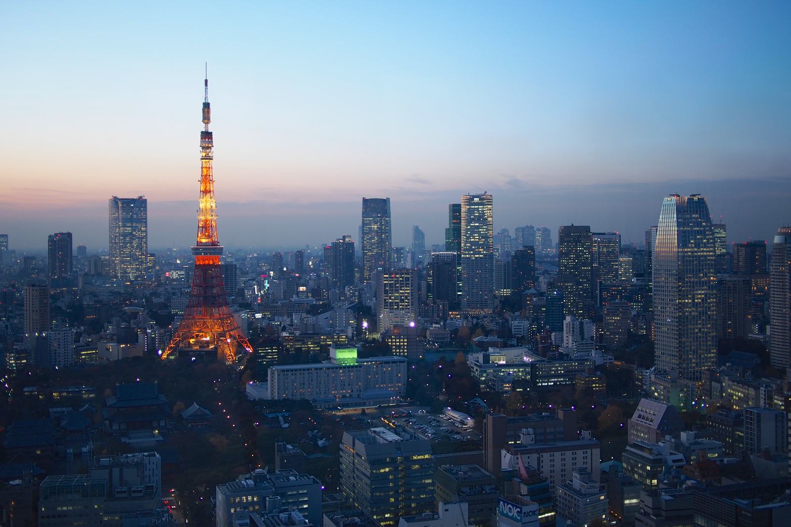 Tokyo's night skyline of high-rise towers, the setting for New Year's Eve and the January 1 sunrise