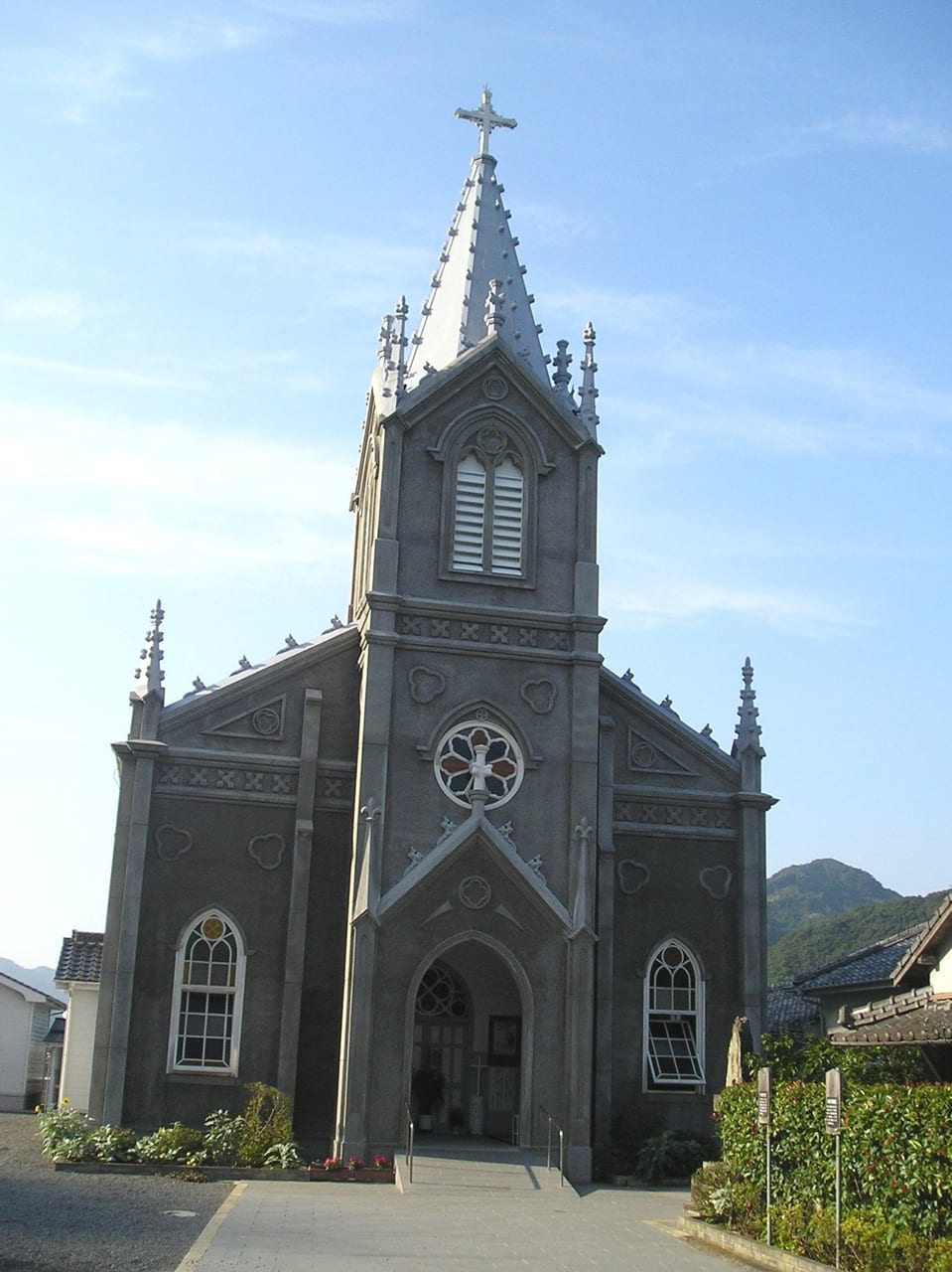 The Gothic exterior of the World Heritage Sakitsu Church above the Amakusa fishing village