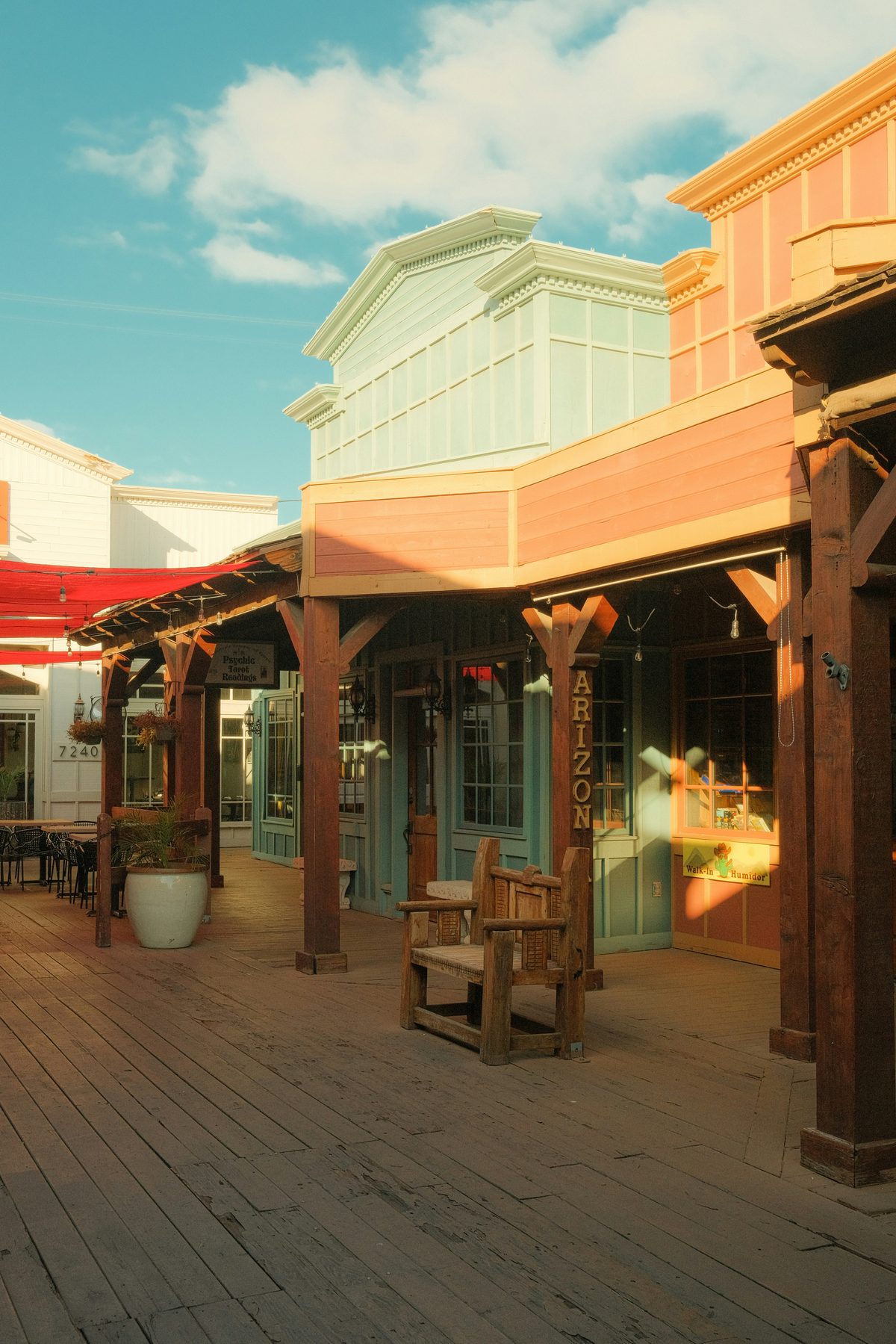 American Village sunset in Chatan: Ferris wheel and colorful buildings along the Okinawa coast