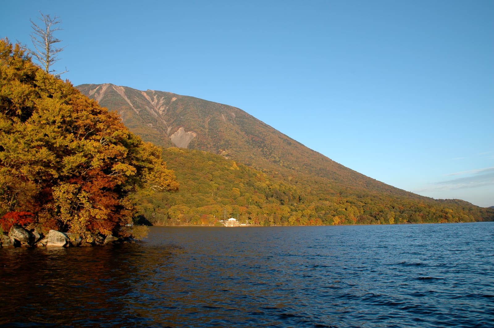 Lake Chuzenji with Mt Nantai and autumn foliage at golden hour