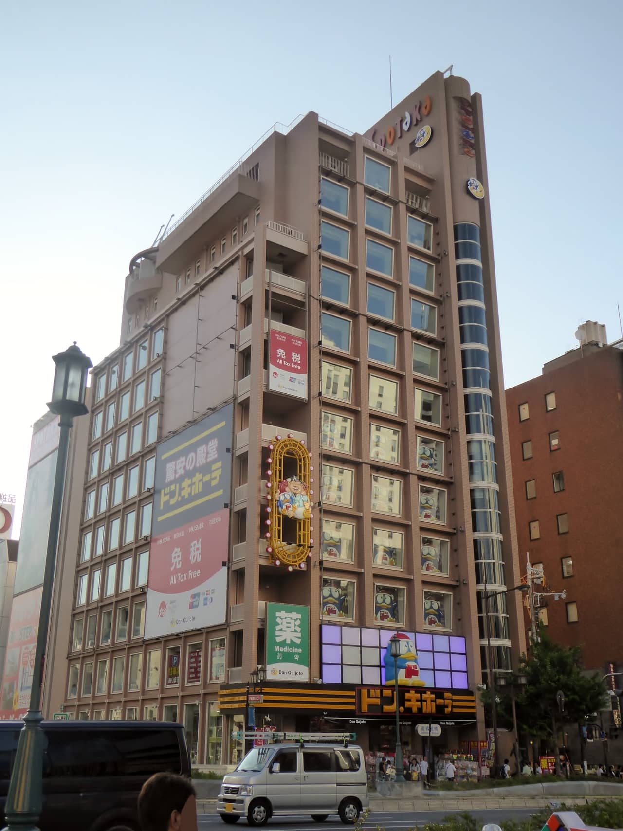 Don Quijote in Dotonbori, Osaka, with the yellow Ferris wheel above the store