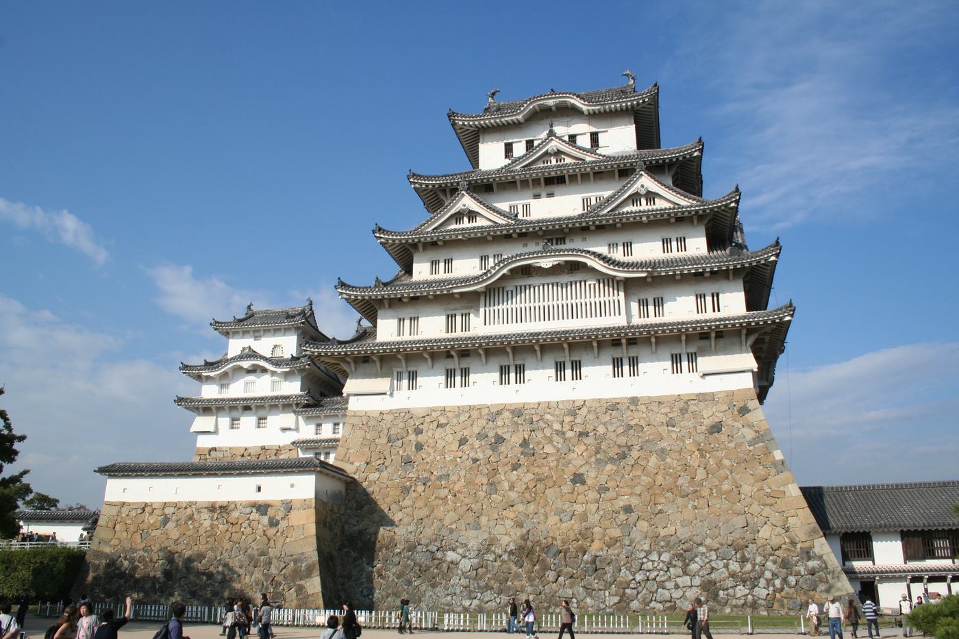 Himeji Castle main keep seen from the Bizenmaru terrace, white plaster walls and tiered eaves