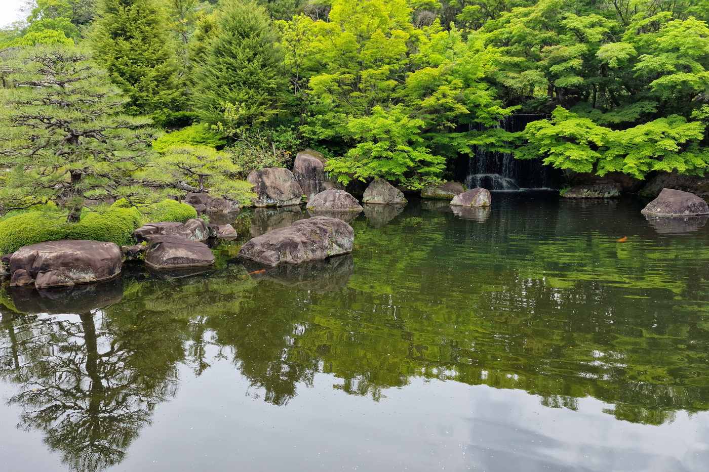 The large pond and waterfall of the residence garden at Koko-en in Himeji