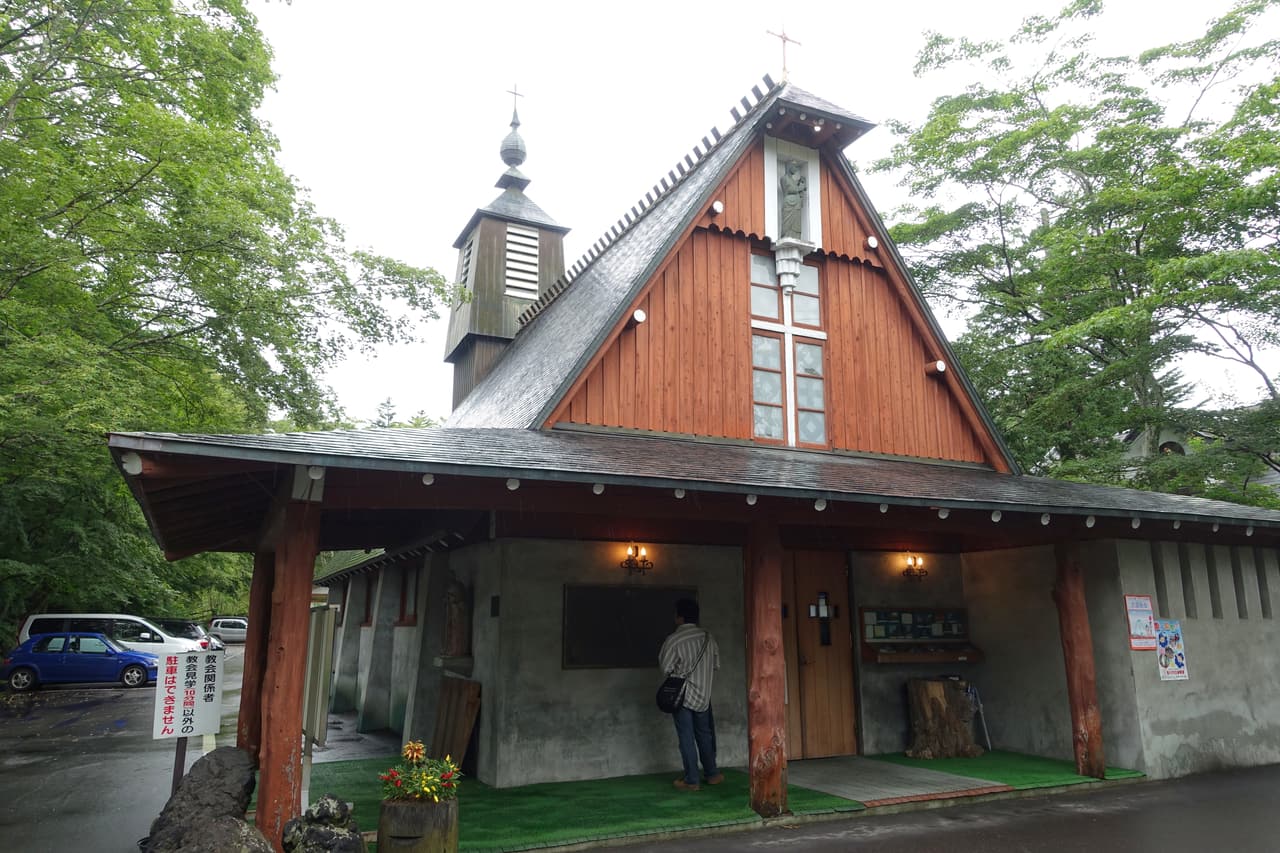 The spire and wooden facade of St. Paul's Catholic Church in old Karuizawa