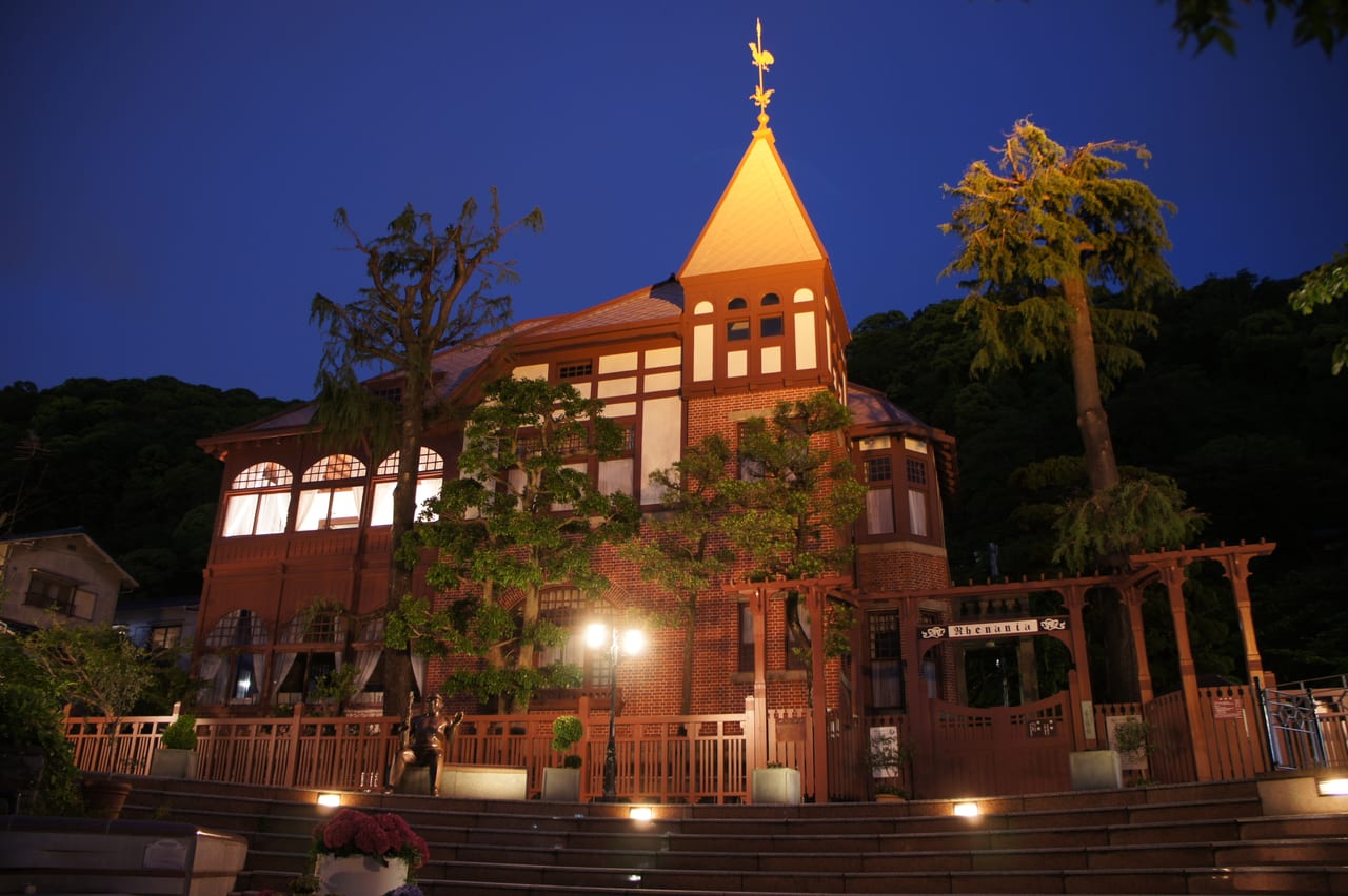 The red-brick Weathercock House in Kobe Kitano with its rooftop weathervane