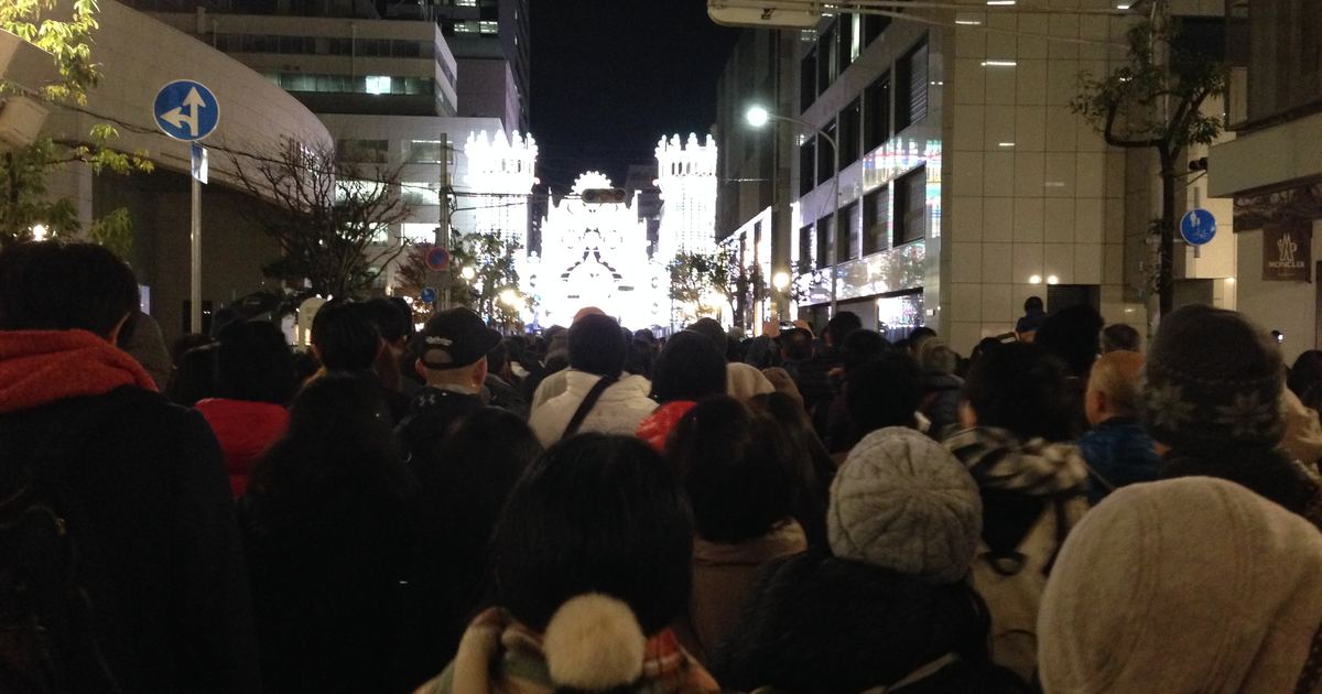 The arched light corridor (galleria) of Kobe Luminarie glowing at night
