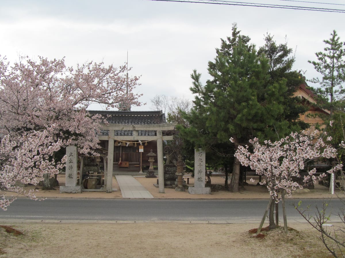 Torii gate and stone name pillar at the entrance of Mankusen Shrine in Izumo
