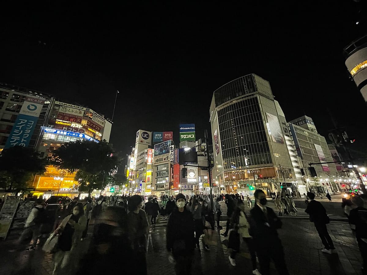 Crowds packed across Shibuya Scramble Crossing — first-timers in Japan most often underestimate crowds, transfers and queue times