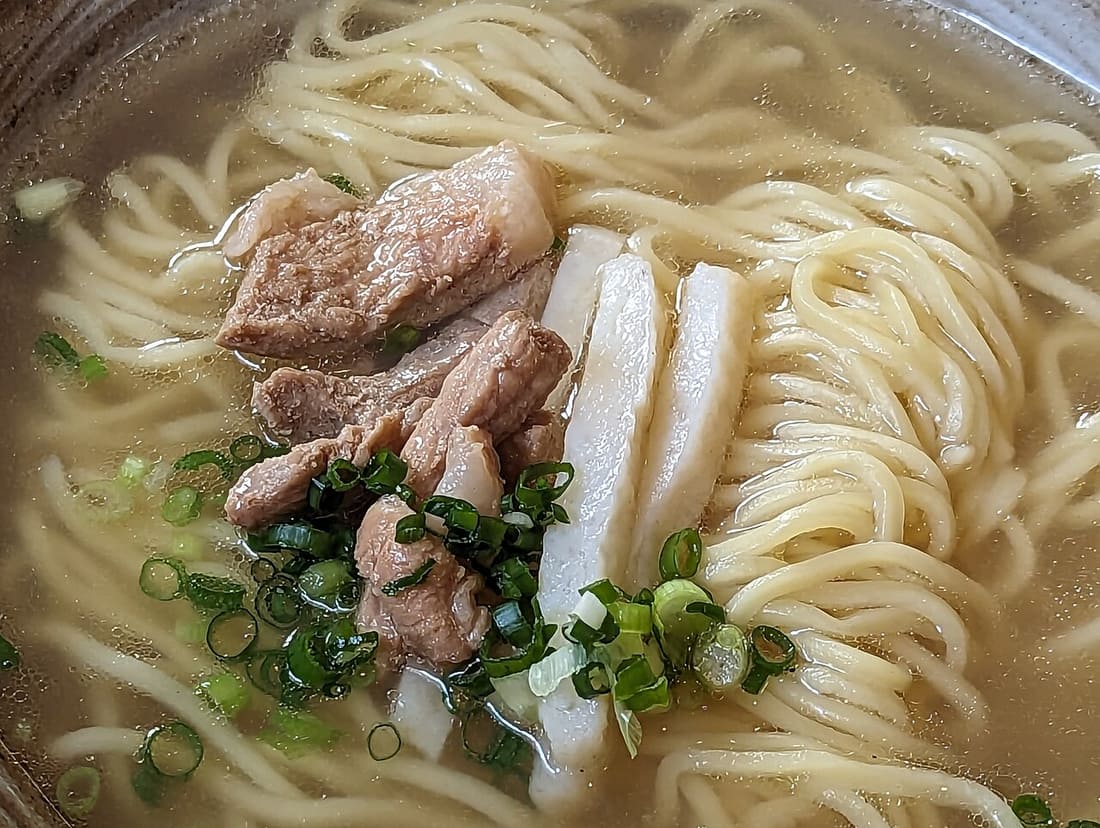 Okinawa soba topped with pork belly, a common local dish in Naha