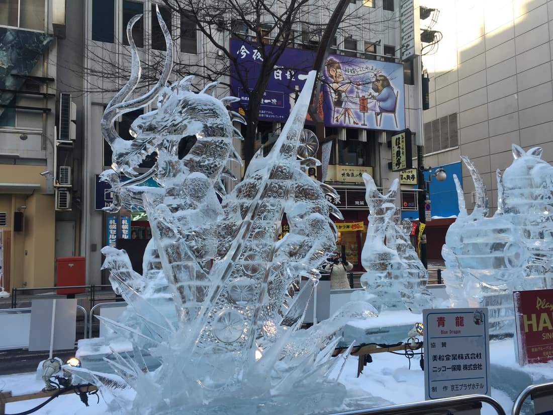 A translucent ice sculpture at Susukino, Sapporo Snow Festival (past-year blue dragon)
