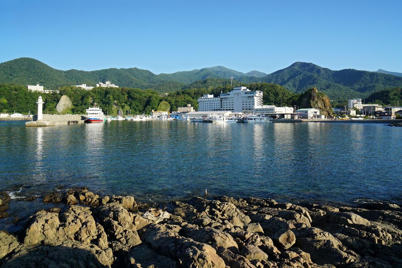 A sightseeing boat at a harbor on Hokkaido's northeastern coast