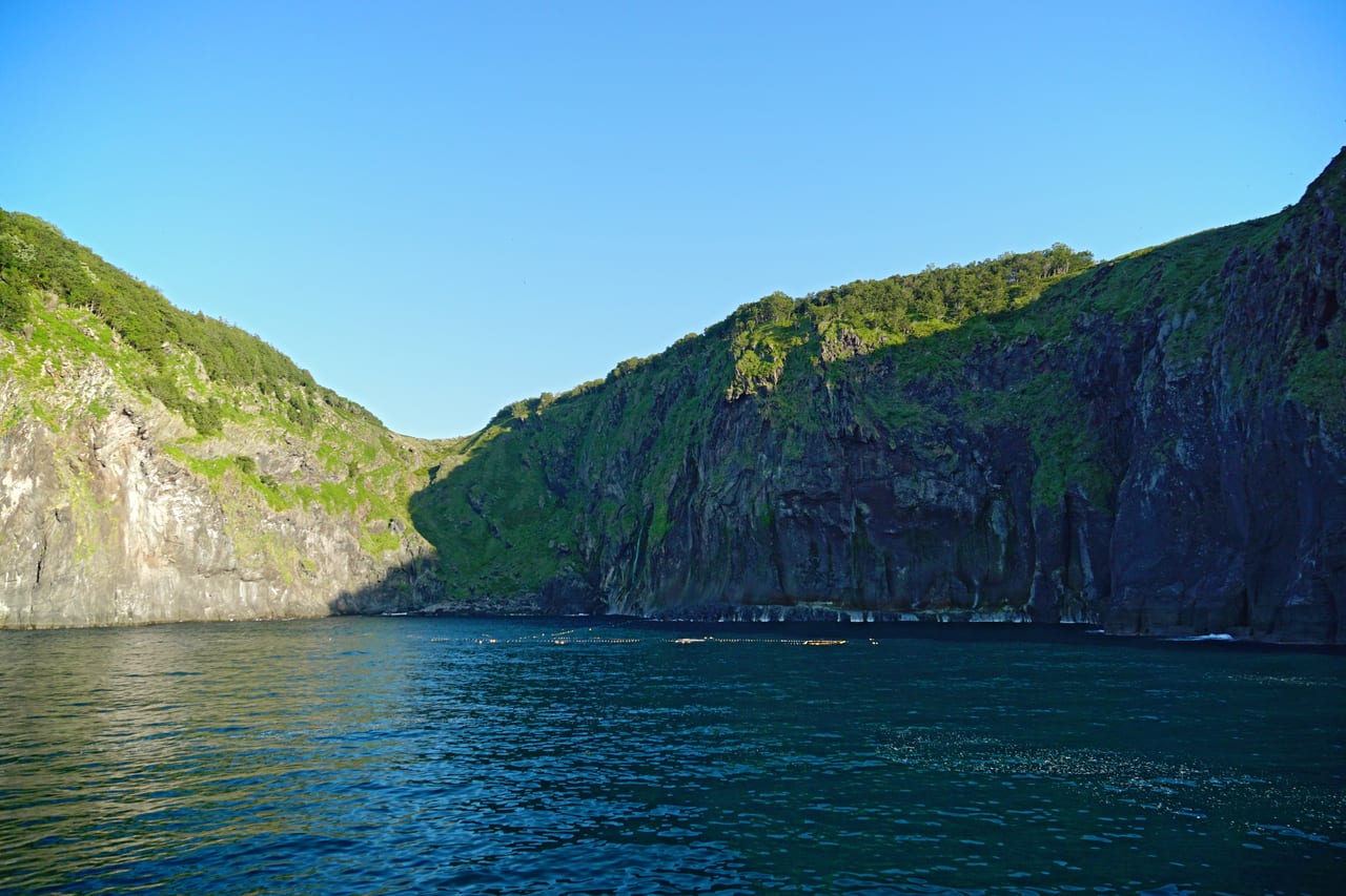The cliff coastline of the Shiretoko Peninsula reaching into the Sea of Okhotsk