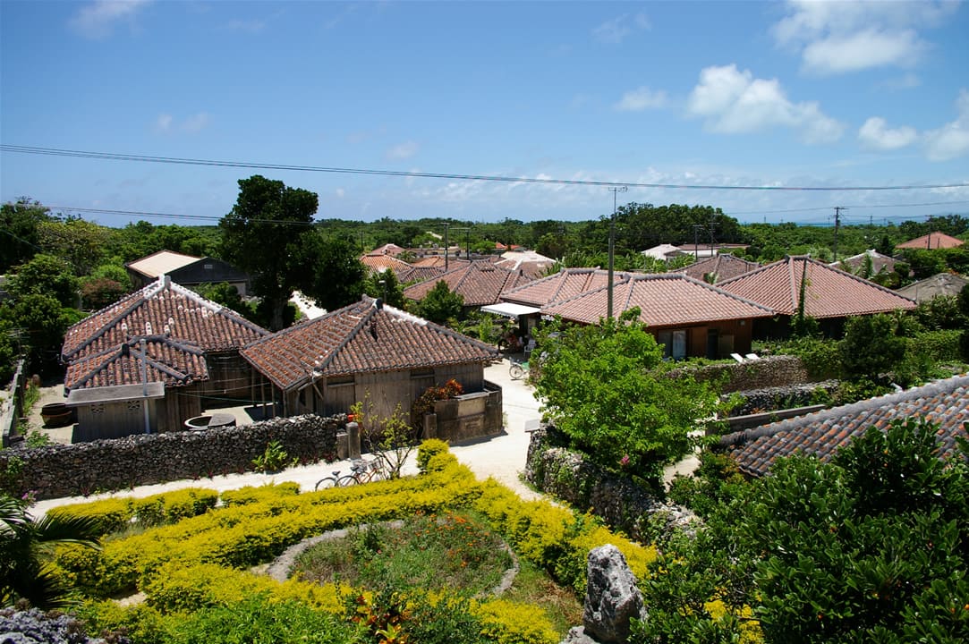 The traditional red-tiled village and white-sand lanes of Taketomi