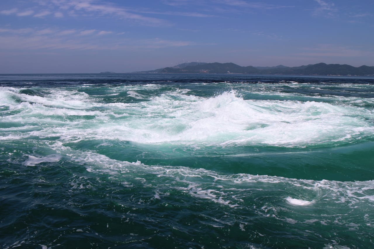 Large whirlpools spinning on the Naruto Strait surface at spring tide