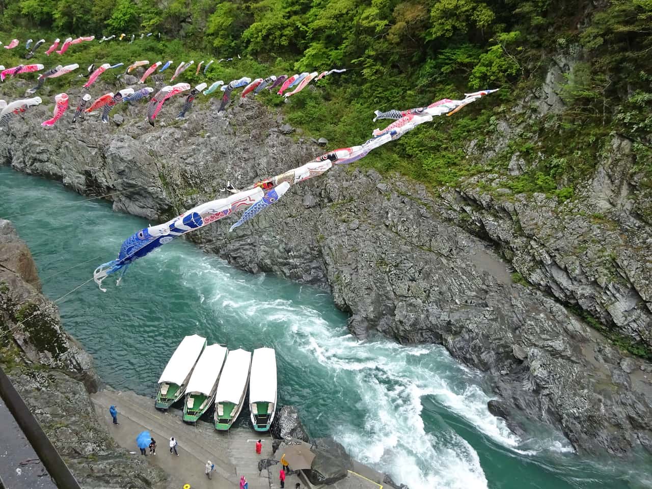 An Oboke gorge sightseeing boat on the Yoshino River below crystalline schist walls