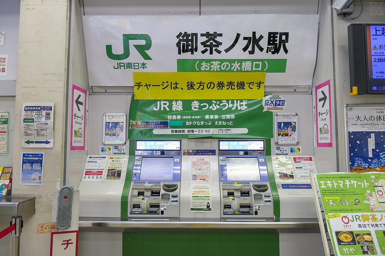 JR station automatic ticket gates — tap an IC card in and out and the system calculates cross-company fares automatically