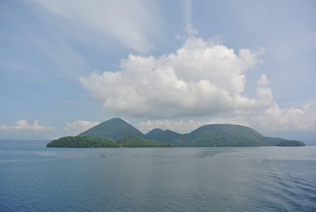 The open view of Lake Toya, a caldera lake, with the Nakajima islands at its center