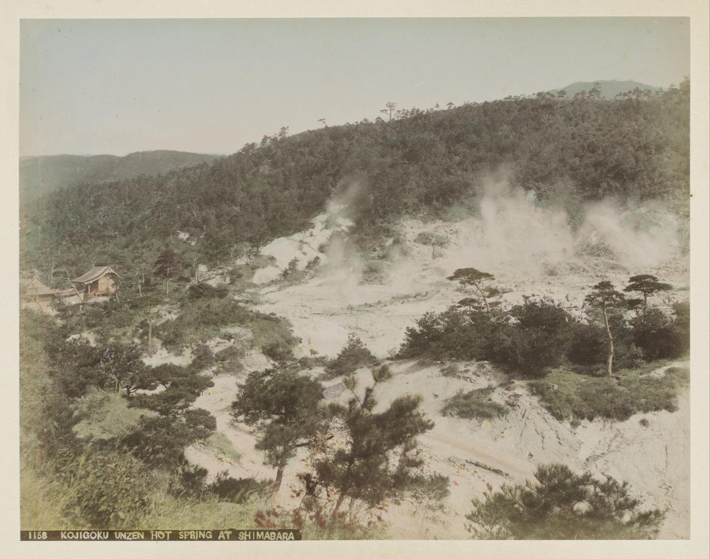 Meiji-era hand-colored albumen print of the steaming Kojigoku geothermal field, captioned KOJIGOKU UNZEN HOT SPRING AT SHIMABARA on the print